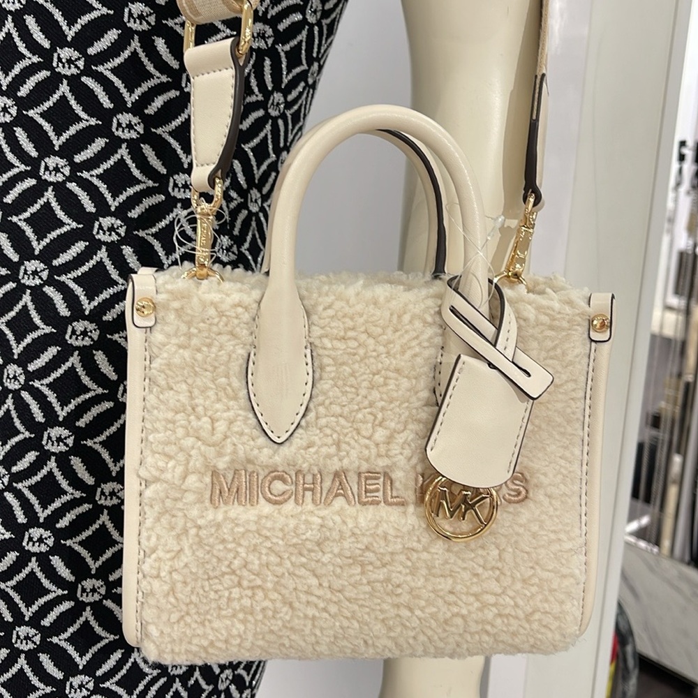 Michael Kors Mirella Extra-Small Sherpa XS SHOPPER XBODY
SHEARLING Crossbody - Picture 6 of 16